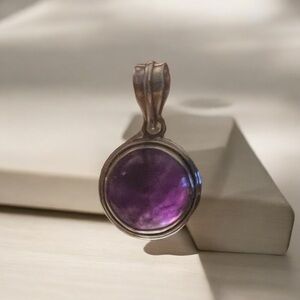 Vintage EUC amethyst set in 925 sterling silver pendant.